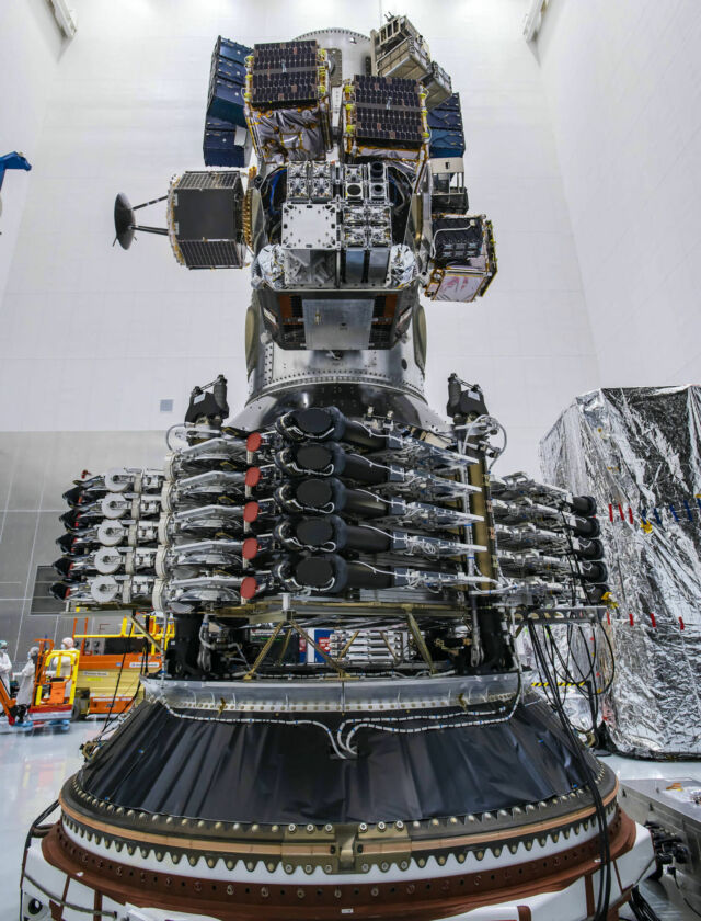 Starlink satellites prior to launch. The black circles in the middle are laser links.